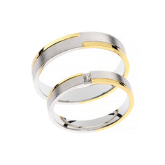 Anillo de boda elegante en oro blanco mate y oro amarillo pulido
