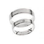 White gold wedding ring with polished finish