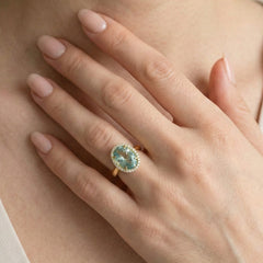 Massive oval blue topaz gold ring