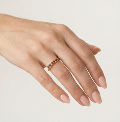 Yellow gold ring with round cut garnets