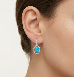 Oválné stříbrné náušnice opál 