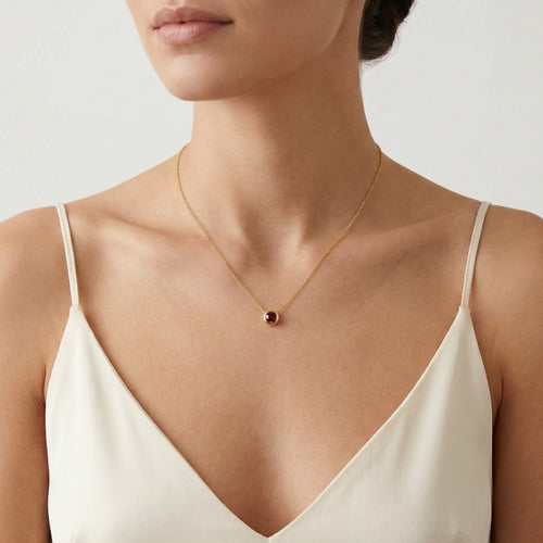Bezel garnet gold necklace