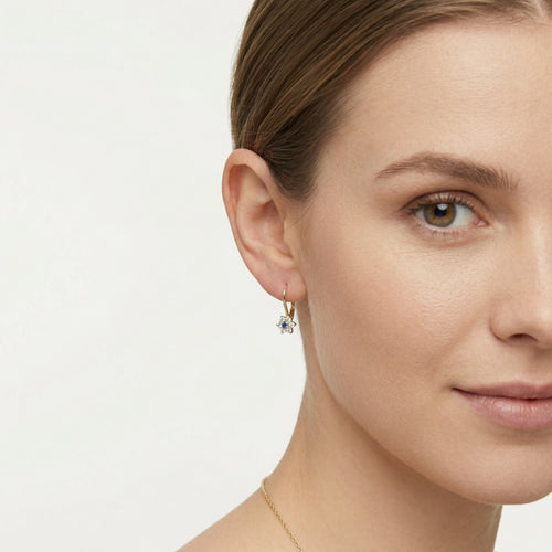 Zlaté náušnice s modrým kubickým zirkonem ve tvaru květiny