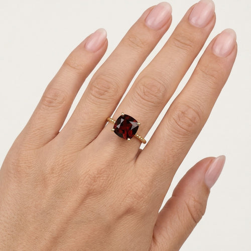 Garnet cushion cut detail ring
