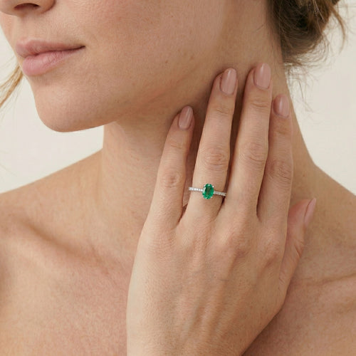 Classic white gold diamond and emerald ring
