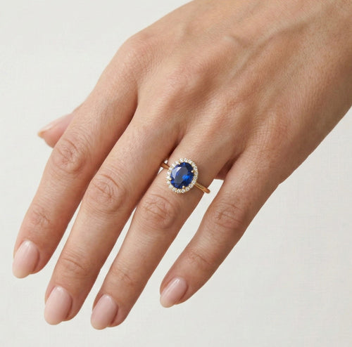 Oval blue quartz in gold ring