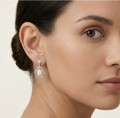 Unique gold earrings with diamond frame and pearl