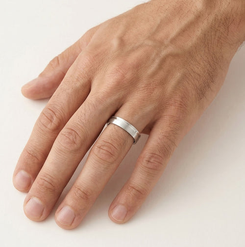 White gold wedding ring with flat polished line