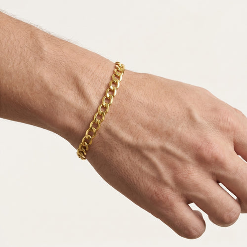 Pulsera maciza de oro tipo curb
