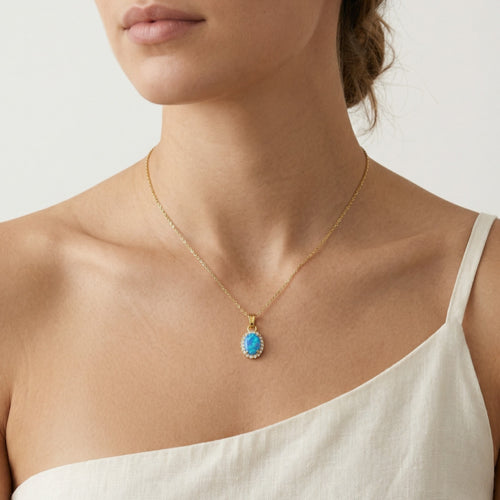 Colgante ópalo azul ovalado con halo