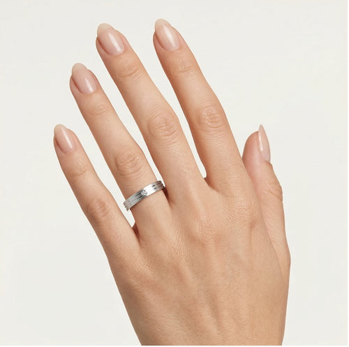 White gold solitaire wedding ring with lines