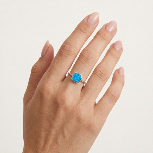 Square flat blue opal ring