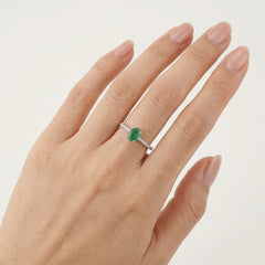 Classic white gold diamond and emerald ring