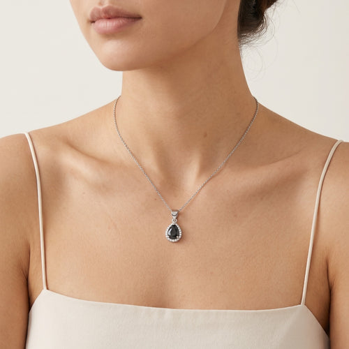 Sterling silver pendant with pear onyx and round zirconia