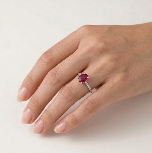 White gold ring with oval ruby and diamonds