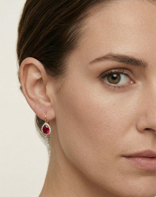 Pear rubellite yellow gold earrings