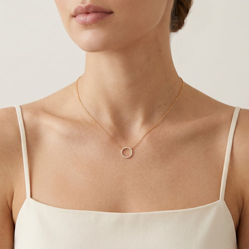 Collar en oro rosa con anillo de zirconia