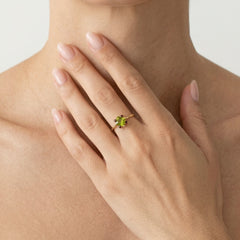 Elegant moldavite and garnet ring