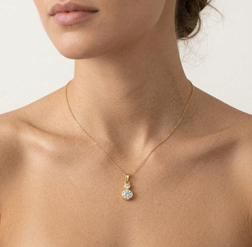 Bezel cubic zirconia gold pendant