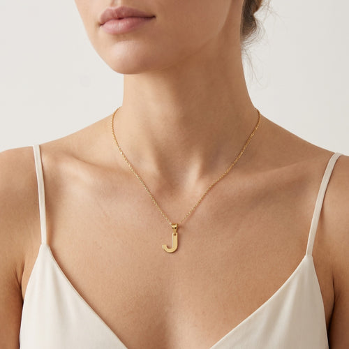 Pendente de oro con la letra J