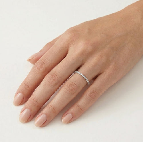 Minimalistic white gold ring with diamonds