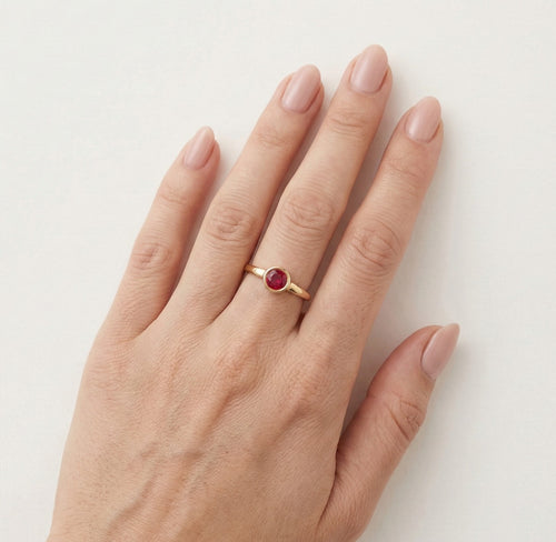 Rose gold ring with round ruby