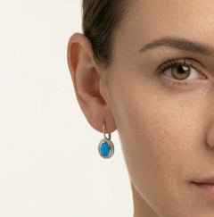 Boucles d’oreilles ovales en opale bleue simples avec fermoir à levier