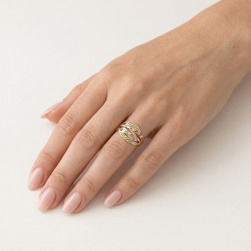 Massive tricolor ring with intricate details