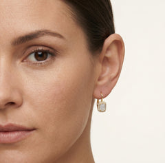 Boucles d’oreilles pendantes royales en or avec zirconiums cubiques