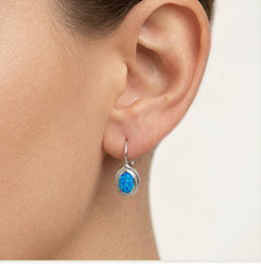 Boucles d’oreilles ovales en opale bleue simples avec fermoir à levier