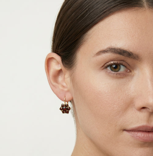 Flower motif garnet drop earrings