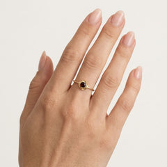 Graceful garnet round fine step cut women ring