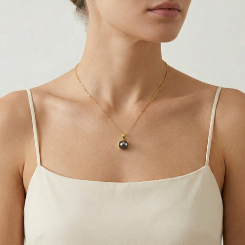 Colgante único con perla negra