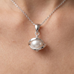 Silver spiral pearl pendant