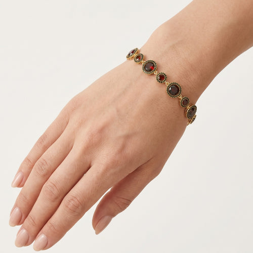 Pulsera artesanal de granate en oro amarillo
