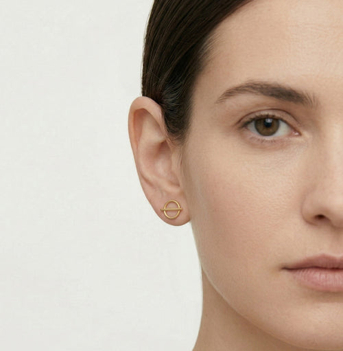 Pendientes de botón Harmony en oro amarillo