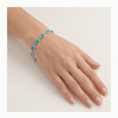 Stříbrný náramek s modrými opálovými akcenty