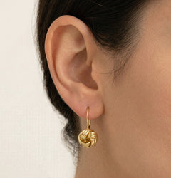 Knotted drop gold earrings