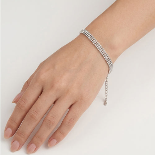 Pulsera tennis de plata con tres líneas de circonitas.