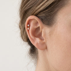 Piercing de oro con perla y zirconia