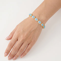 Pulsera real de ópalo azul en oro amarillo