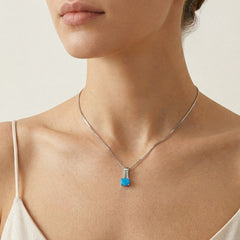 Symmetric blue opal pendant
