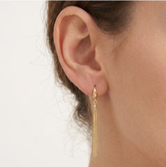 Delicate gold dangle earrings with chains