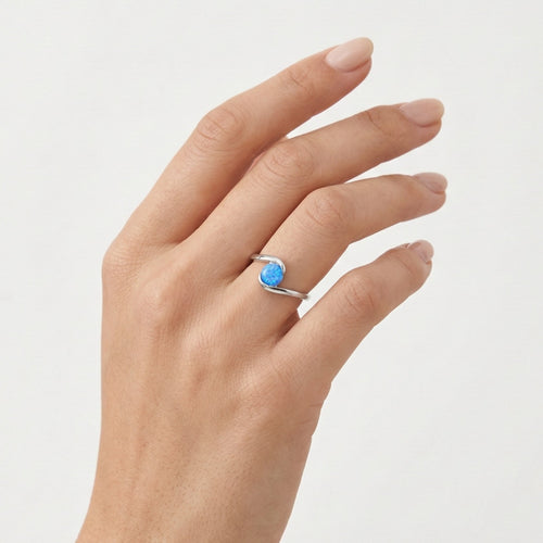 Softly twisted blue opal ring
