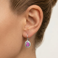 Ovalförmige Ohrringe mit rosafarbenem Opal in Zargenfassung und Klappverschluss