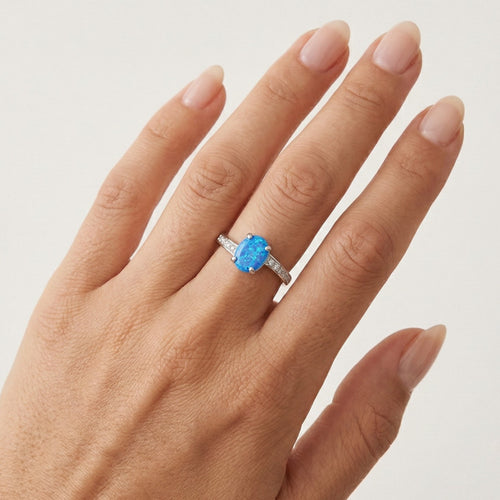 Shiny blue opal twisted ring