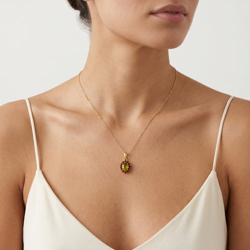 Stilvoller Anhänger aus 14kt Gold mit Moldavit und Granat
