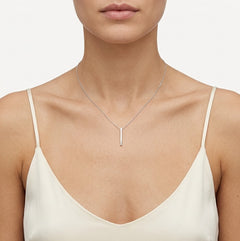 Minimalist white gold necklace with a long plate pendant