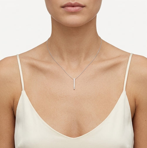 Minimalist white gold necklace with a long plate pendant