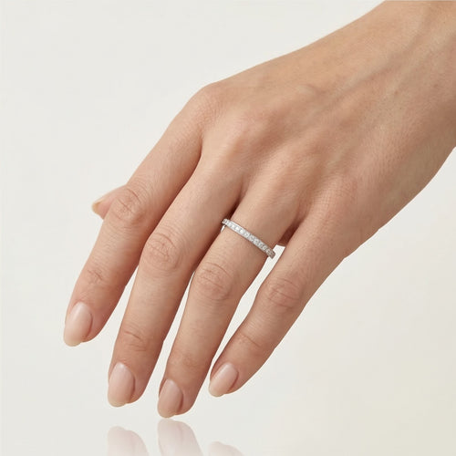 Thin white and yellow gold diamond line ring